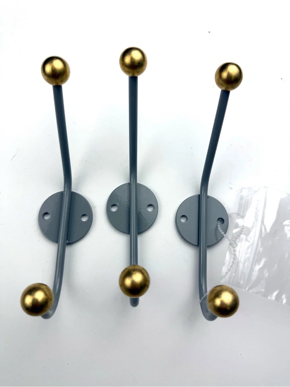 3 West Elm MCM coat hooks - gray with gold balls